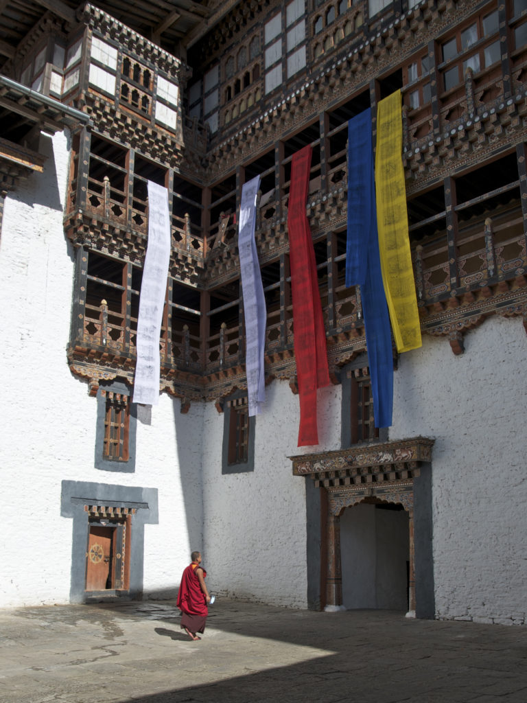 Freshly printed prayer flags drying in the courtyard of Trongsa Dzong